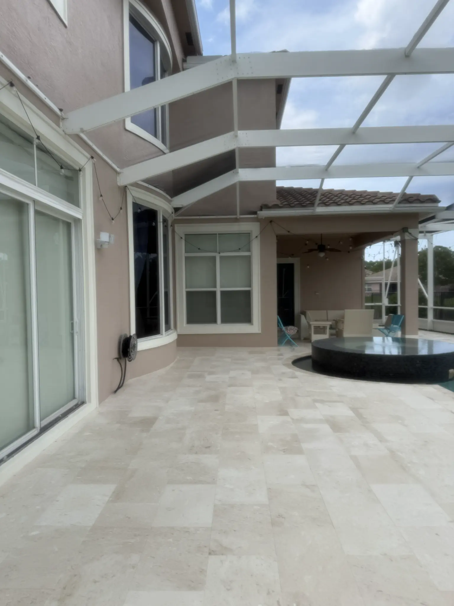 Palm City shellstone pool deck before Pure Flow Soft Wash cleaning and sealing